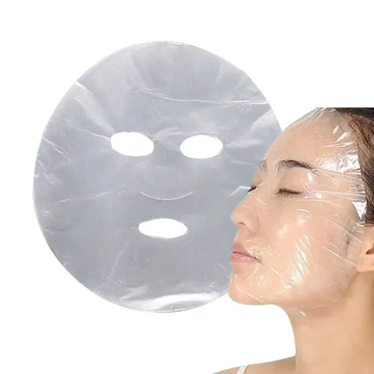 100 unidades de mascarillas desechables transparentes para el rostro, envoltura de plástico, limpiador facial completo, pegatinas para el cuello, herramientas de maquillaje y belleza facial.